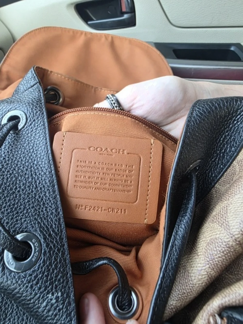 Coach backpack signature
